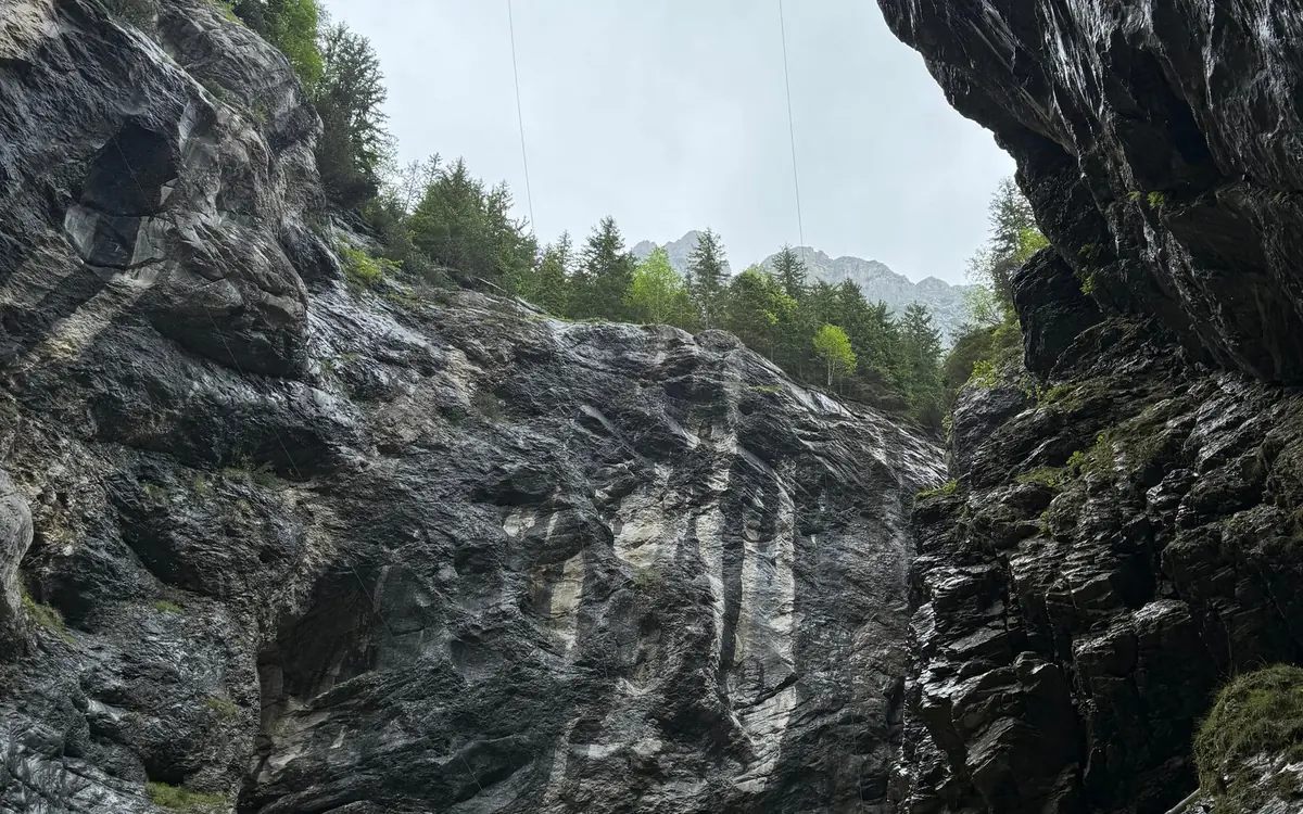 Walkway through the narrow glacier canyon at Grindelwald near Interlaken